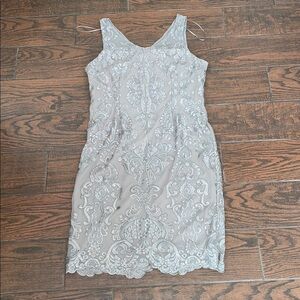 Classic evening dress, Champagne color with sequins, hits below the knee
